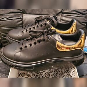 Alexander McQueen Black and Gold Sneakers